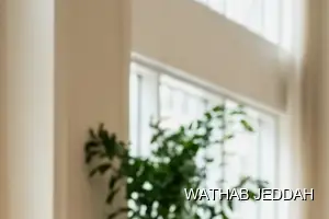 فريق وثاب جدة أثناء تنظيف سجاد في حي الأندلس بجدة