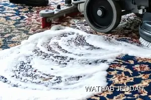 فريق وثاب جدة أثناء تنظيف سجاد في حي القرينية بجدة