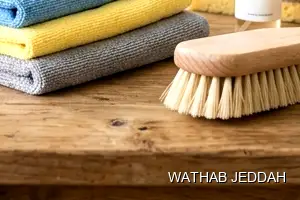 فريق وثاب جدة أثناء تنظيف ستائر في حي الفلاح بجدة