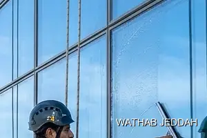 Wathab Jeddah team performing Glass Facade Cleaning in Al Nahdah, Jeddah