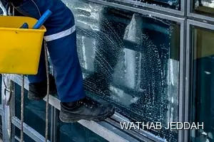 Wathab Jeddah team performing Glass Facade Cleaning in Al Sharafiyah, Jeddah