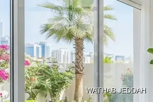 فريق وثاب جدة أثناء تنظيف منازل في حي الربوة بجدة