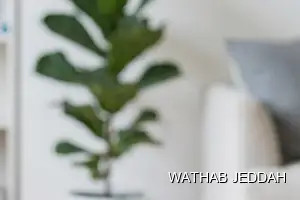 فريق وثاب جدة أثناء تنظيف مراتب في حي طيبة بجدة