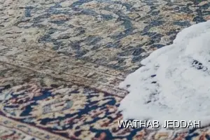 فريق وثاب جدة أثناء تنظيف موكيت في حي القرينية بجدة