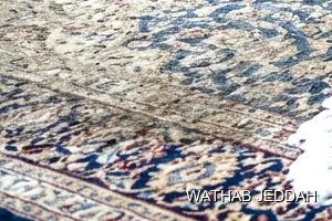 فريق وثاب جدة أثناء تنظيف موكيت في حي الرياض بجدة