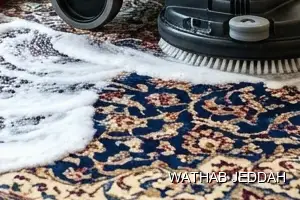 فريق وثاب جدة أثناء تنظيف موكيت في حي الوزيرية بجدة