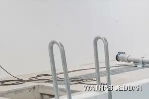 فريق وثاب جدة أثناء تنظيف خزانات في حي البساتين بجدة