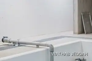 فريق وثاب جدة أثناء تنظيف خزانات في حي الفضيلة بجدة