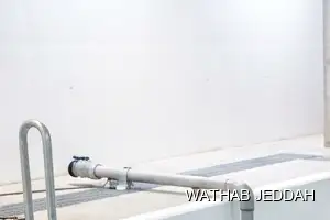 فريق وثاب جدة أثناء تنظيف خزانات في حي السامر بجدة