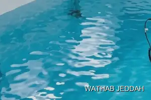 فريق وثاب جدة أثناء تنظيف خزانات في حي الثغر بجدة